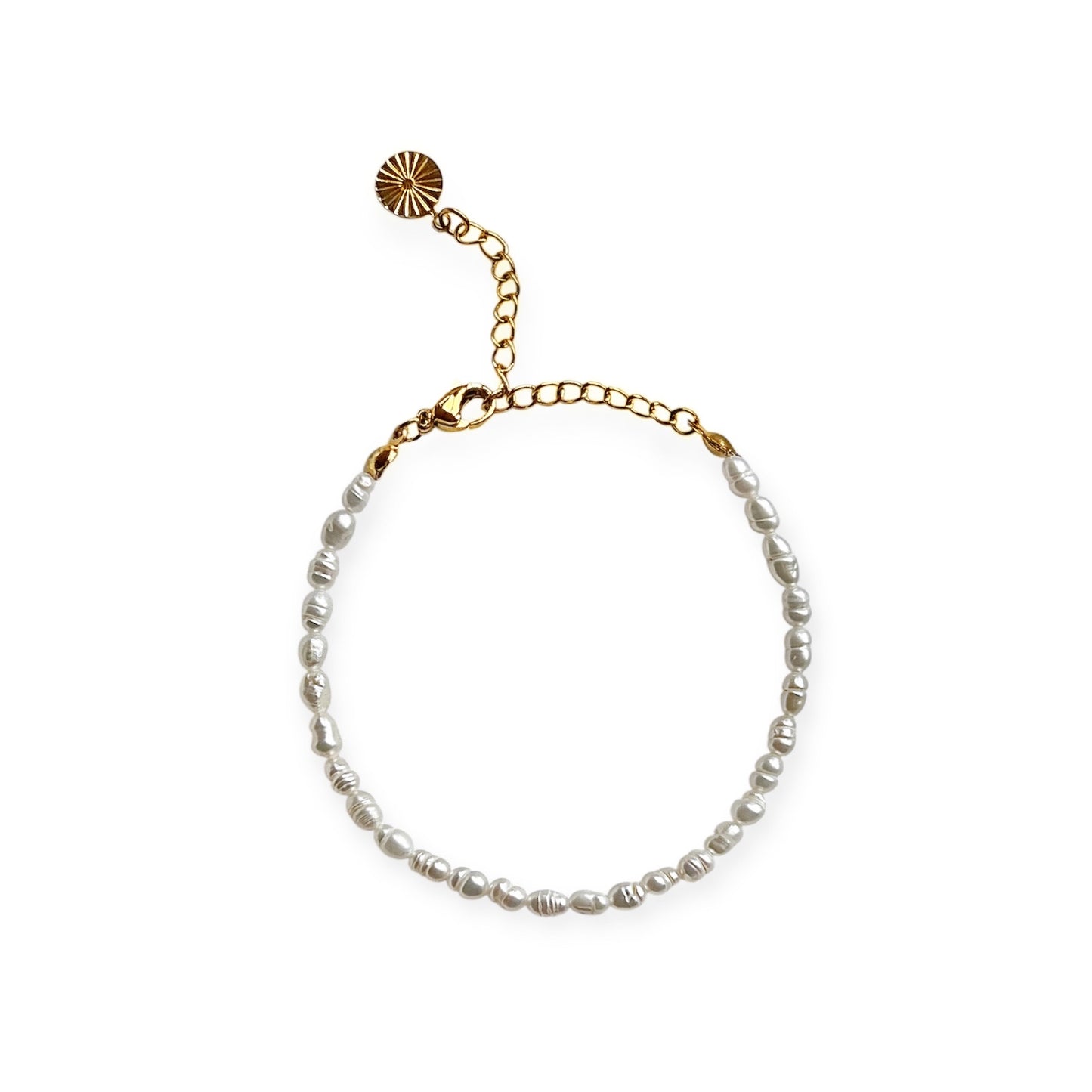 Armbånd med små ferskvandsperler Guld